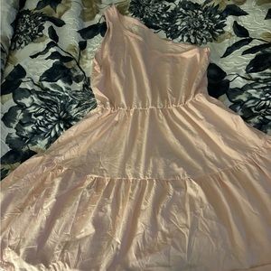 A very cute one shoulder pink dress size medium.
